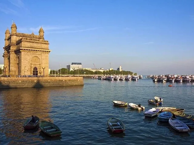 Gateway of India and boats in the harbor